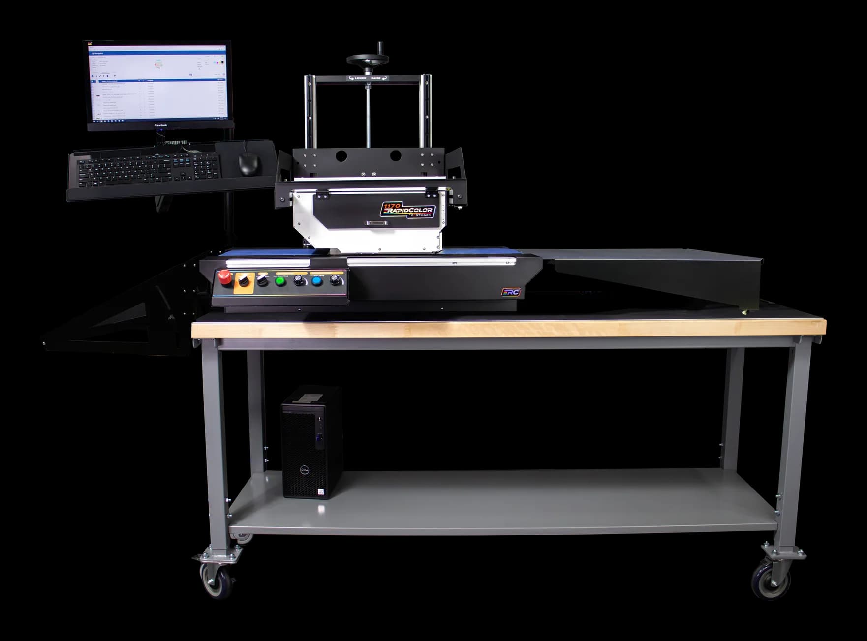 Postmark 1170 RapidColor Package Pro system with feed table and delivery tray on its workbench